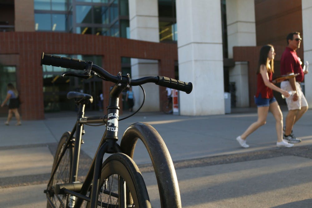 Students lock their bikes outside of the Sun Devil Fitness Complex in Tempe, Arizona on Thursday, March 16, 2017. 