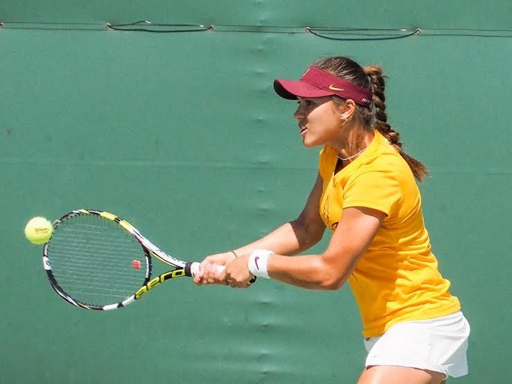 Junior Desirae Krawczyk returns the ball to San Jose State during a singles match against San Jose State, Friday, March 20, 2015, at Whiteman Tennis Center in Tempe. (J. Bauer-Leffler/The State Press)
