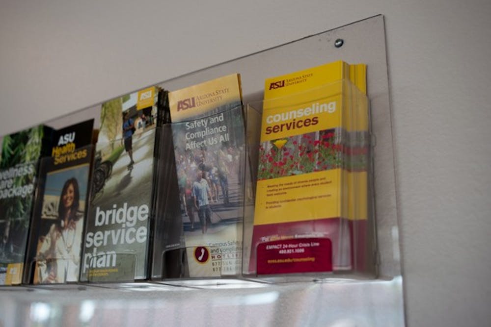 Counseling services pamphlets located outside the counseling services office on the 3rd floor of the student services building in Tempe. (Photo by Andrew Ybanez)