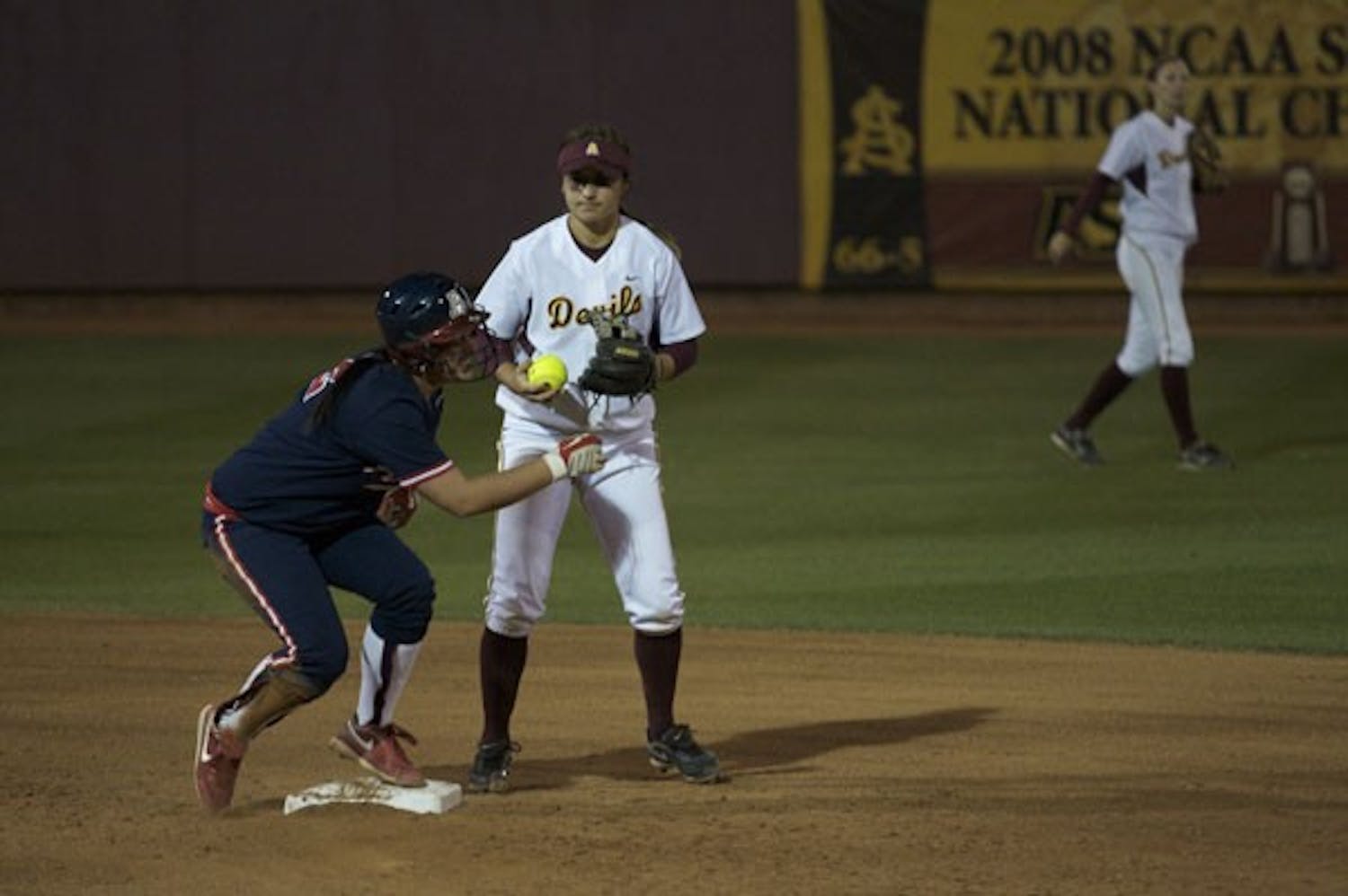 TWO OF THE BEST: ASU freshman baseman Sam Parlich looks on after a play at second base during ASU's 12-6 loss to U A are ranked in the top 10 nationally. (Photo by Scott Stuk)