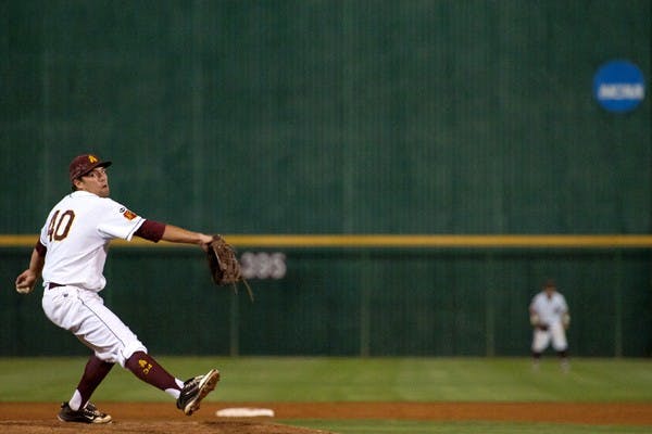 Another Shutout: ASU junior Mitchell Lambson reaches back for a pitch against Oregon on April 2 in Tempe. The Sun Devils topped BYU, 3-0, in a rare Monday night game in behind seven scoreless innings from junior pitcher Kyle Ottoson. 