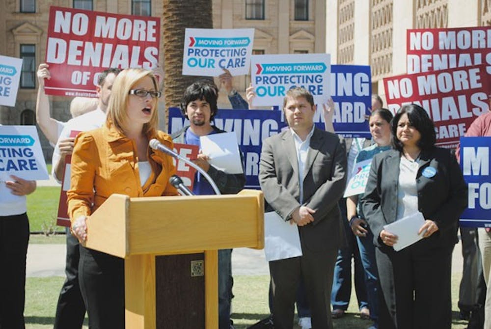 COMMEMORATING REFORM: Sen. Kyrsten Sinema spoke to supporters of the health care law during a press conference Wednesday commemorating the one-year anniversary of the bill's signing. (Photo by Yvonne Gonzalez)