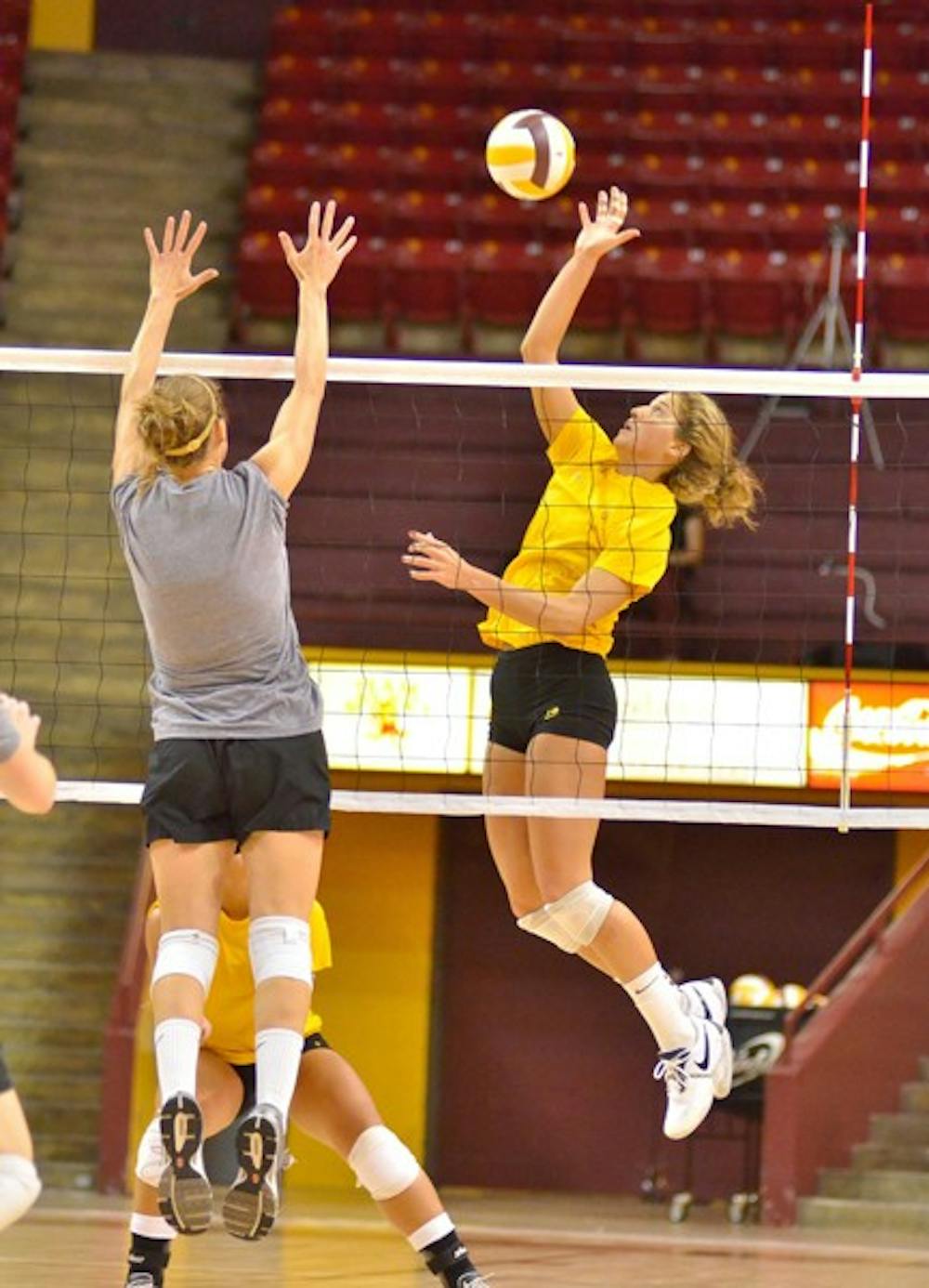 Friday start: ASU redshirt sophomore outside hitter Ashley Kastl goes up for the spike during the Alumnae Game on Saturday. The Sun Devils open their season on Friday against Denver at home. (Photo by Aaron Lavinsky)