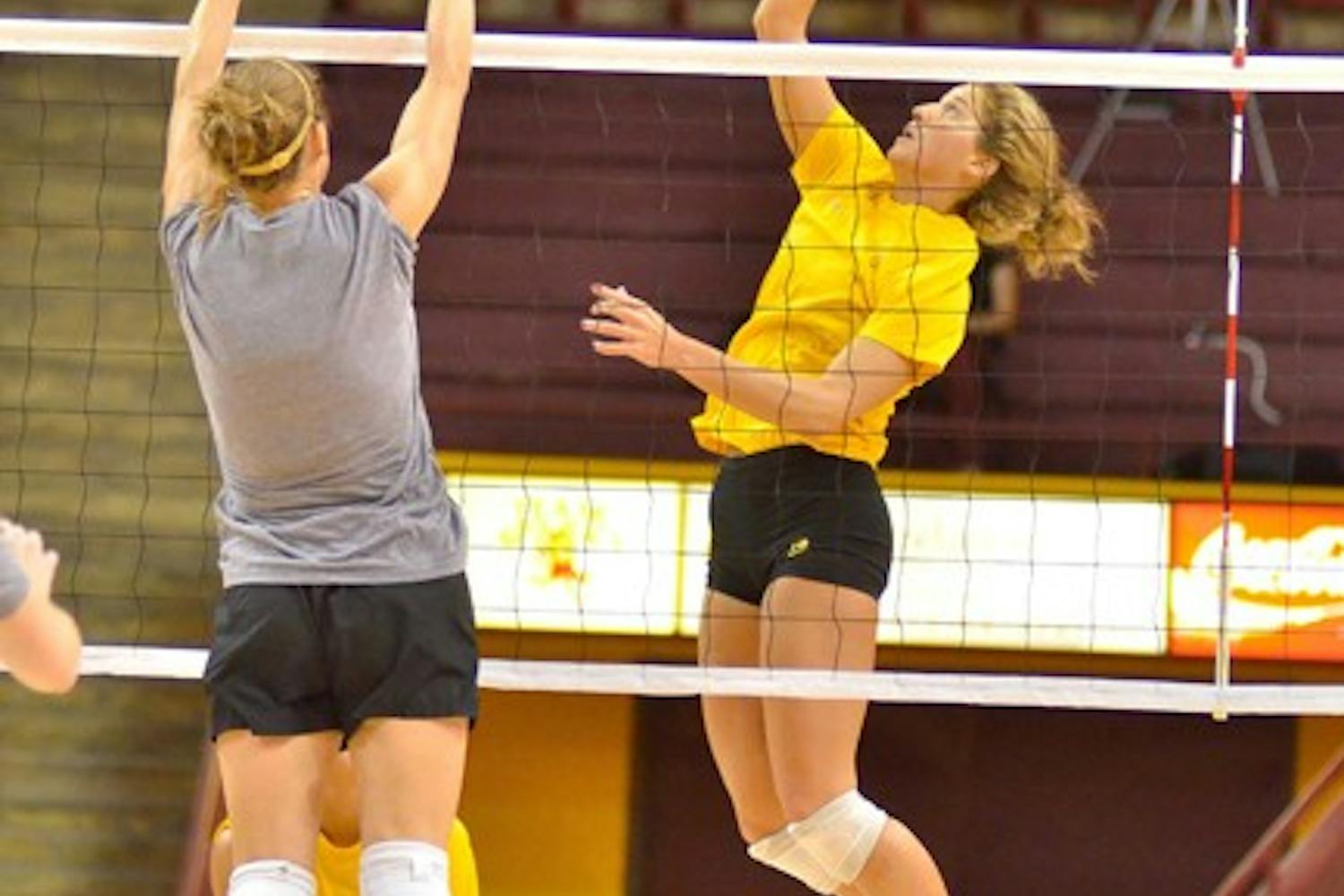 Friday start: ASU redshirt sophomore outside hitter Ashley Kastl goes up for the spike during the Alumnae Game on Saturday. The Sun Devils open their season on Friday against Denver at home. (Photo by Aaron Lavinsky)