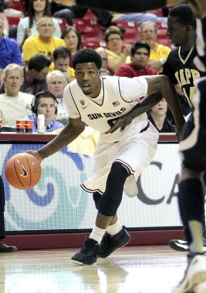 Senior wing Carrick Felix dribbles around an Arkansas-Pine Bluff defender in ASU’s 67-54 victory on Wednesday night.  (Photo by Sam Rosenbaum)
