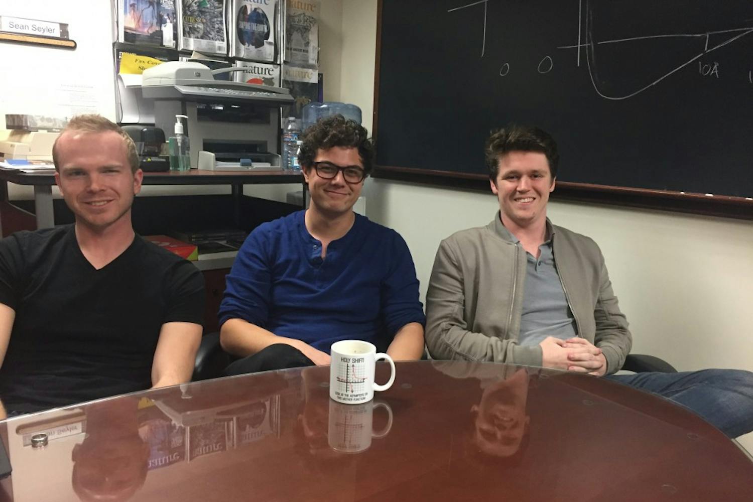 Biophysics researchers (left to right)&nbsp;David Dotson,&nbsp;Taylor Colburn and&nbsp;Ian Kenney sit in a conference room in ASU's&nbsp;Bateman Physical Science Center on Friday, Jan. 20, 2017.