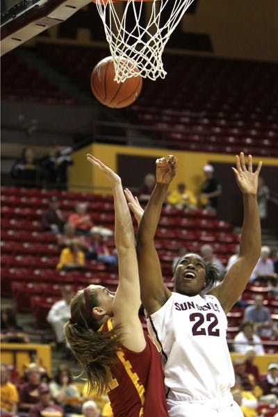 Redshirt senior forward Janae Fulcher takes a contested shot under the basket over a USC defender in the Sun Devils' 67-60 loss to the Trojans on March 3. (Photo by Sam Rosenbaum)