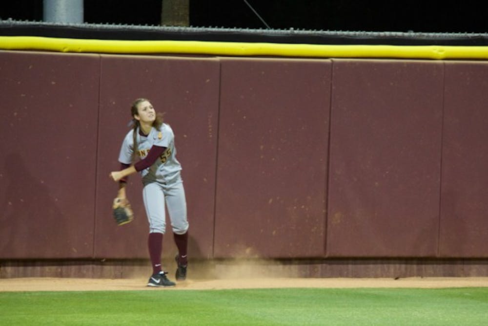 Junior outfielder Elizabeth Caporuscio throws back a fly ball during the game against the Arizona Wildcats on Sunday, March 30 at Farrington Stadium. ASU lost  6-5 in a 10-inning game. (Photo by Becca Smouse)