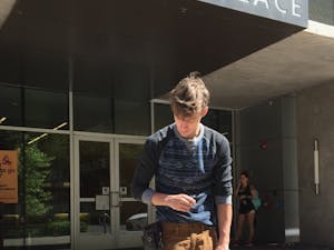 Patrick McCarthy works with service dog Gonzo.