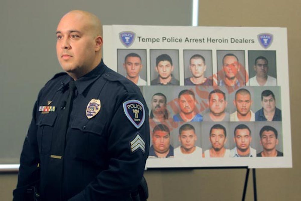 OPERATION DARK CARNIVAL: Tempe police Sergeant Steve Carbajal spoke at a conference on Wednesday, reviewing a seven month long heroin trafficking investigation. (Photo By Andy Jeffreys) 