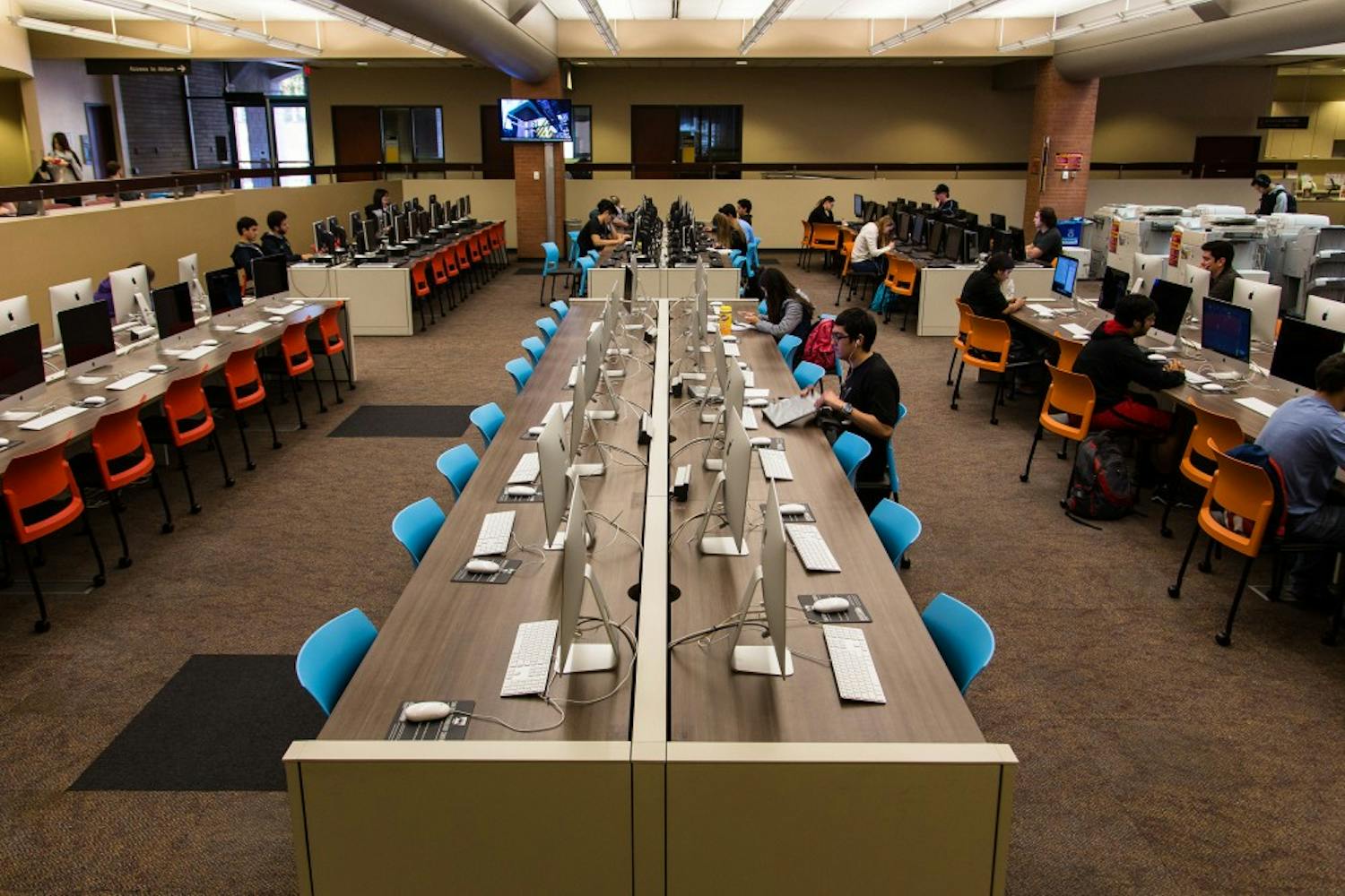 ASU students study inside the Computing Commons, which is located in the heart of the Tempe campus, on Jan. 21. ASU has been recognized for its innovation in online classes.