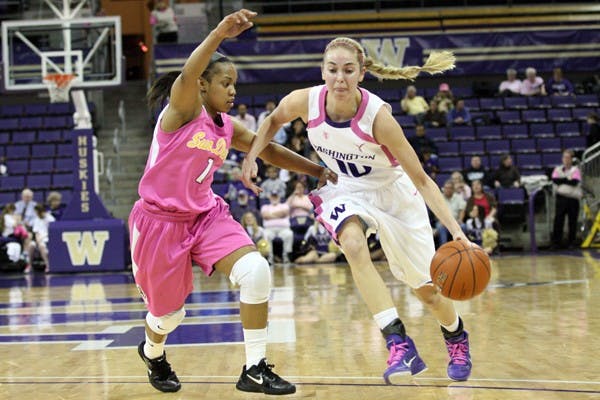 Saying goodbye: ASU redshirt senior guard Dymond Simon guards UW freshman guard Dominique Banks during the Sun Devils’ 71-63 victory over the Huskies on Thursday. Simon and the rest of the ASU seniors will be honored on Saturday during their last home game against UCLA. (Photo Courtesy of the Daily of Washington)