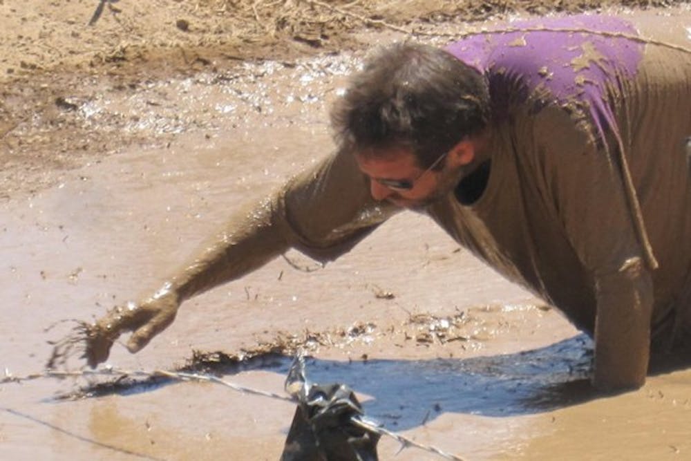 Jim Brandt, 48, traverses one of the many obstacles in the Warrior Dash. (Photo courtesy of Jim Brandt)