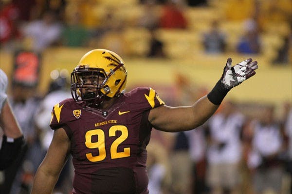 Freshman defensive lineman Jaxon Hood communicates with the ASU sideline during the Sun Devils’ 63-6 win over NAU on Aug. 30. (Photo by Sam Rosenbaum)
