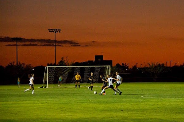 An ASU defender deflects a pass in a scrimmage against NAU on Aug. 15 in West campus. 