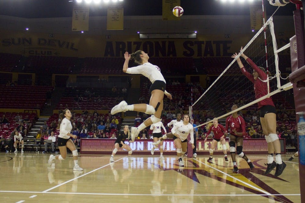 ASU freshman outside hitter Ivana Jeremic (21) jumps high for a spike in the second set of a 3-0 loss to the Stanford Cardinal in Wells Fargo Arena in Tempe, Arizona, on Friday, Nov. 18, 2016.