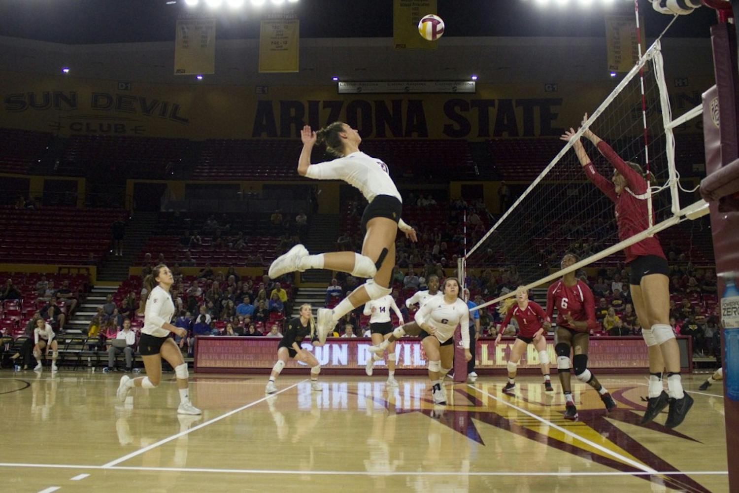 ASU freshman outside hitter Ivana Jeremic (21) jumps high for a spike in the second set of a 3-0 loss to the Stanford Cardinal in Wells Fargo Arena in Tempe, Arizona, on Friday, Nov. 18, 2016.