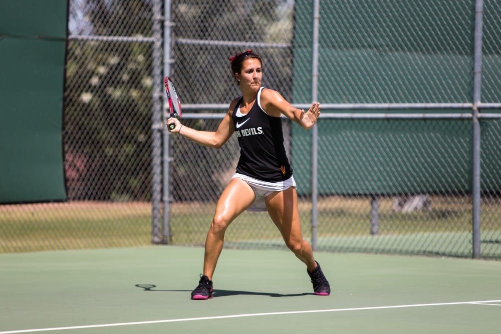 ASU junior doubles tennis player Stephanie Vlad hits the ball against the UCLA pair of Robin Anderson/Jennifer Brady at the Whiteman Tennis Center on April 3rd, 2015. Vlad and partner junior Desirae Krawczyk would fall to the number 13 ranked pair 8-2.