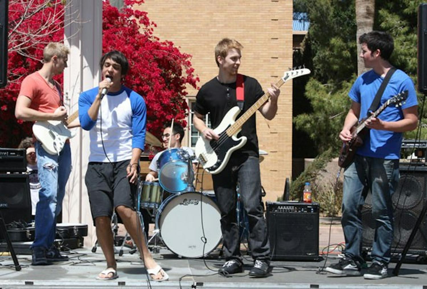 MUSIC AND SHOES: If You Say Atlantic performs on Hayden Lawn Monday afternoon. The band was part of Tom's Shoe Drive for Haiti, which collected gently used shoes to be sent to Haiti. (Photo Jessica Weisel)