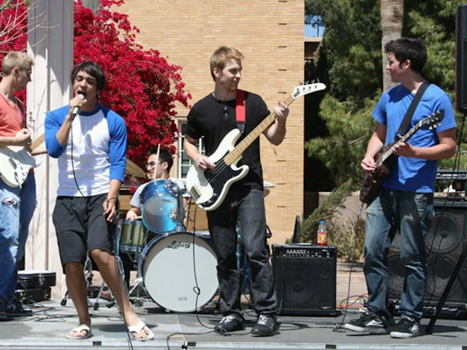 MUSIC AND SHOES: If You Say Atlantic performs on Hayden Lawn Monday afternoon. The band was part of Tom's Shoe Drive for Haiti, which collected gently used shoes to be sent to Haiti. (Photo Jessica Weisel)