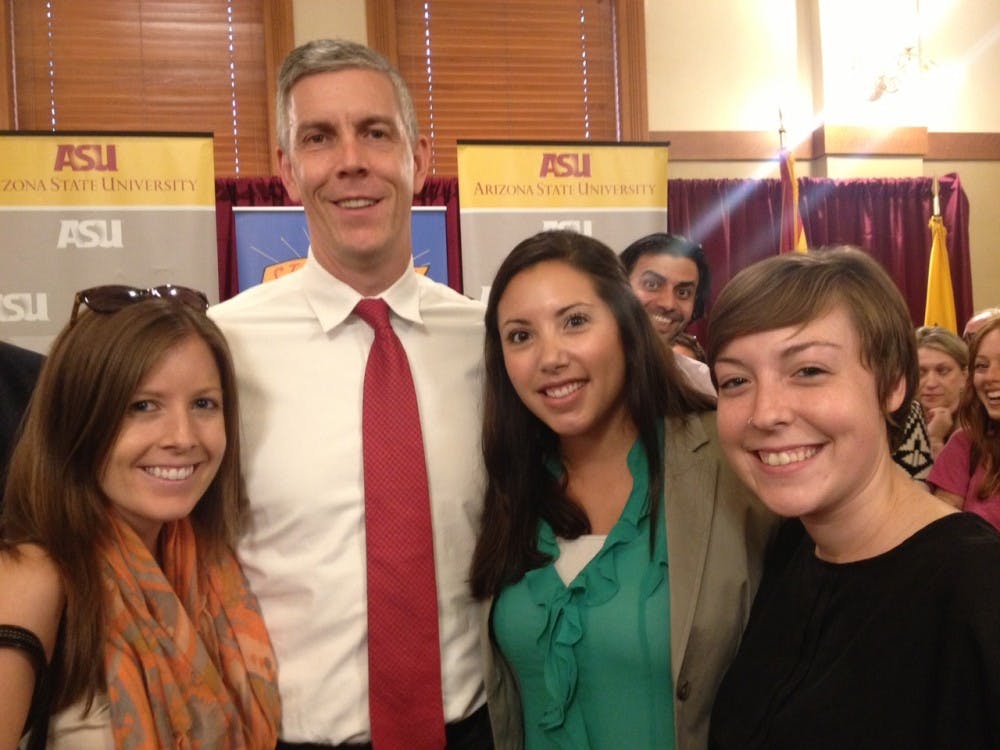 Alex Miller (right) and other students pose with U.S. Secretary of Education Arne Duncan when he visited in Tempe. Miller says she finds purpose and inspiration through the Teach for America program. (Photo courtesy of Alex Miller)