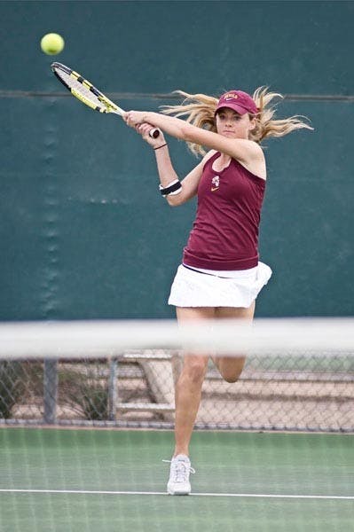 FOLLOW THROUGH: ASU senior Micaela Hein delivers a backhand during a match last season. (Photo by Kyle Thompson)