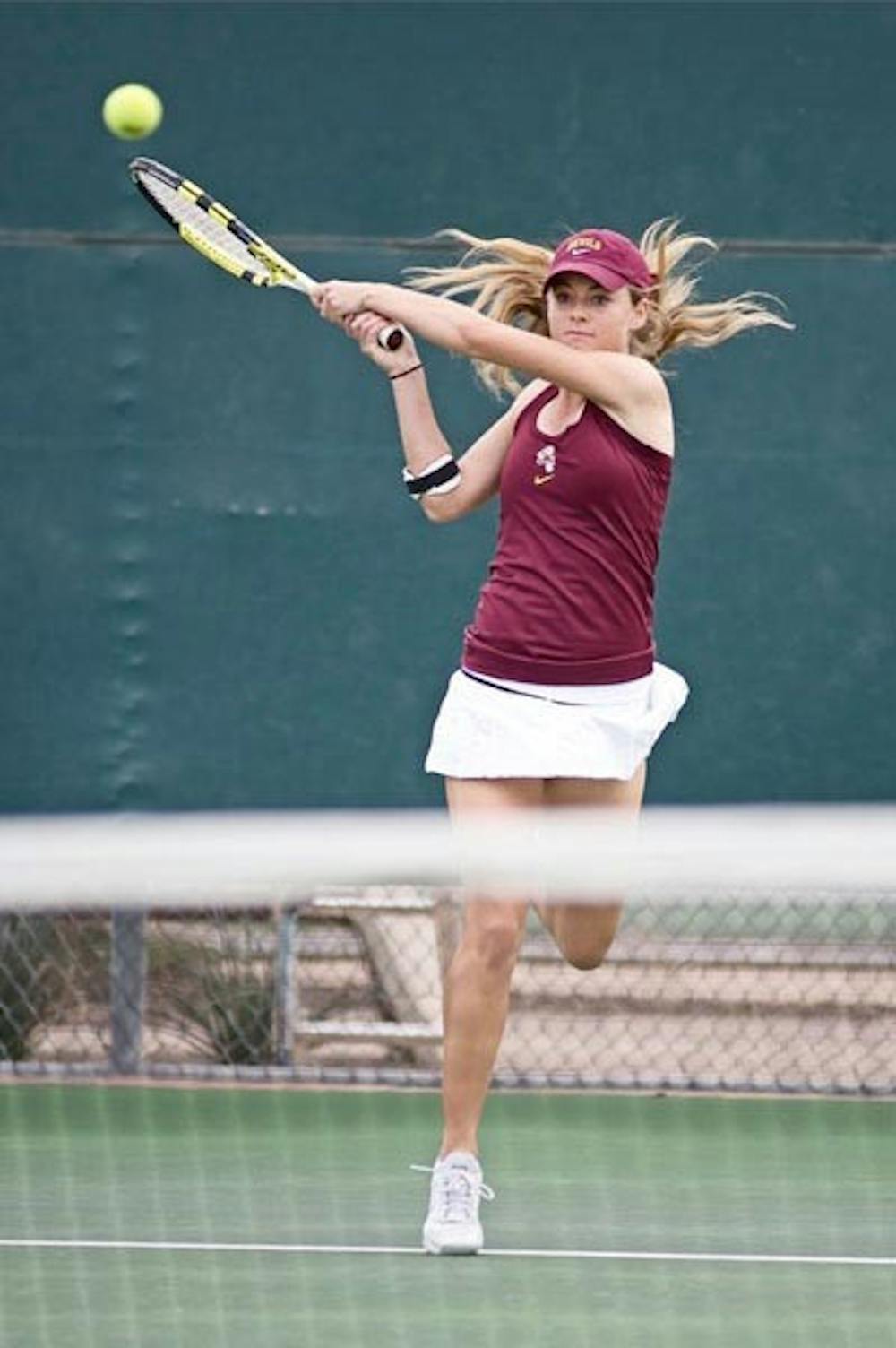 FOLLOW THROUGH: ASU senior Micaela Hein delivers a backhand during a match last season. (Photo by Kyle Thompson)