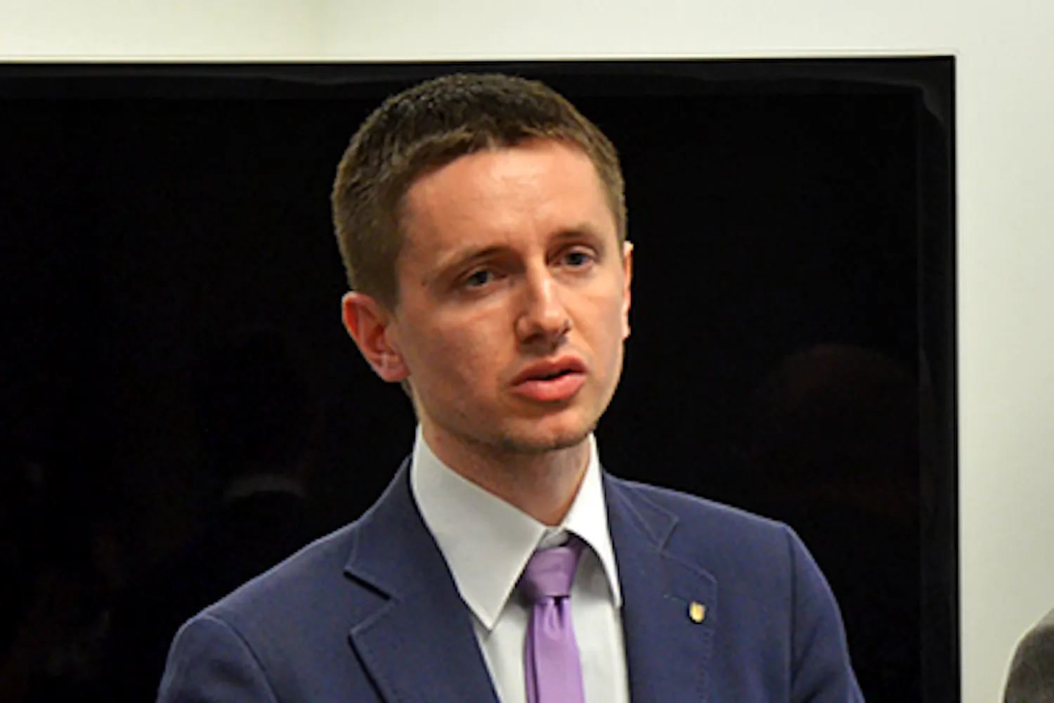 Serigy Shtukarin, Center for Political Studies, Donetsk, Volunteer at the Open World Program, speaks of the economical corruption of Putin. He says, "Russians are very sensitive to this issue, and Putin is sensitive to sanctions that block him from access to his money." Though, despite Putin's dictatorship, he tells us there are organizations that advocate for the people. (Photo by Rachel Nemeh)