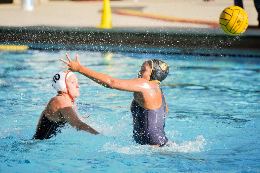 Sophomore Taylor Bertrand tries to block a pass in a match against University of Pacific on&nbsp;Sunday, March 20, 2016 at the Mona Plummer Aquatic Complex in Tempe, AZ. ASU water polo won 5-3.