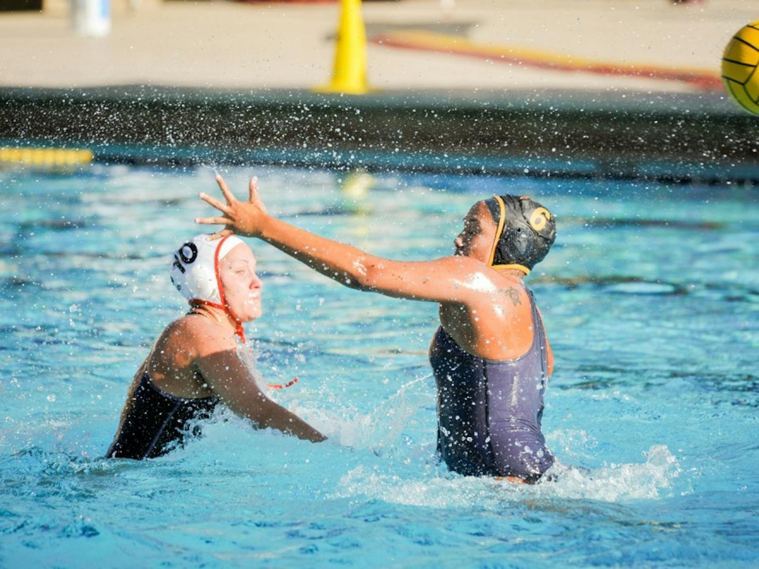 Sophomore Taylor Bertrand tries to block a pass in a match against University of Pacific on&nbsp;Sunday, March 20, 2016 at the Mona Plummer Aquatic Complex in Tempe, AZ. ASU water polo won 5-3.