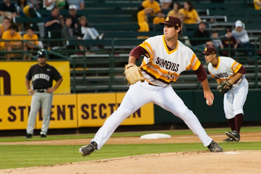Junior pitcher Ryan Kellogg delivers from the mound in a game against Long Beach State on Saturday, March 7, 2015 at Phoenix Municipal Stadium. Kellogg pitched seven scoreless innings in a 4-2 Sun Devil loss to the Dirtbags. (Ben Moffat/The State Press)