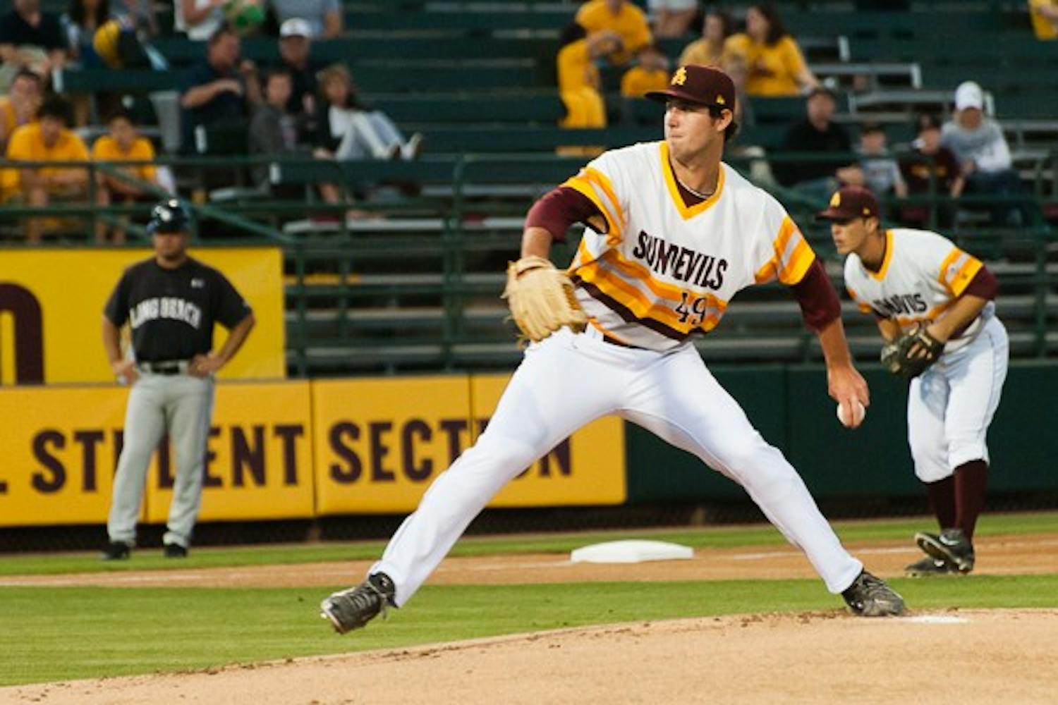 Junior pitcher Ryan Kellogg delivers from the mound in a game against Long Beach State on Saturday, March 7, 2015 at Phoenix Municipal Stadium. Kellogg pitched seven scoreless innings in a 4-2 Sun Devil loss to the Dirtbags. (Ben Moffat/The State Press)