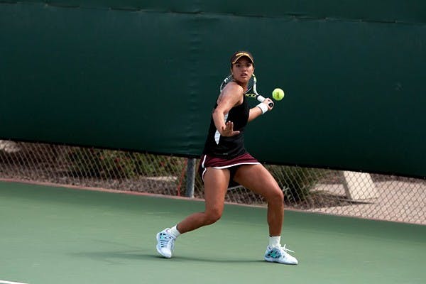 Sophomore Desirae Krawczyk returns the ball with a forehand on April 4. ASU’s Krawczyk and freshman Alexandra Osborne won their doubles match against Colorado 8-4. (Photo by Mario Mendez)