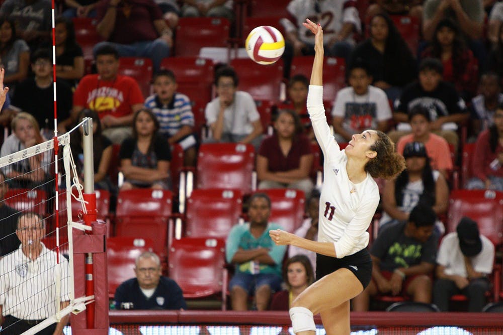 Junior outside hitter BreElle Bailey strikes the ball over the net in the third set against University of Nevada, Las Vegas during the Red Lion Invitational on Friday, Sept. 18, 2015 at Wells Fargo Arena in Tempe. The Sun Devils defeated the Rebels 3 games to none (25-10, 25-21, 25-15). 