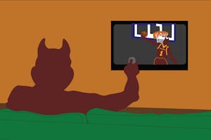 sparky watching basketball