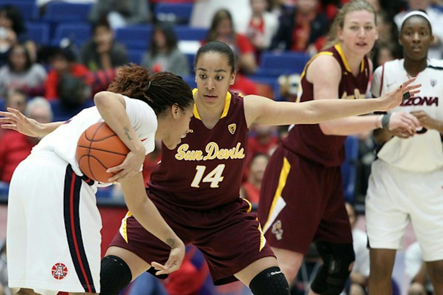 No dice: ASU freshman guard Adrianne Thomas defends during the Wildcats’ 73-61 victory on Sunday. The Sun Devils trailed for most of the game but were unable to mount a comeback in the game’s final minutes. (Photo Courtesy of Steve Rodriguez)