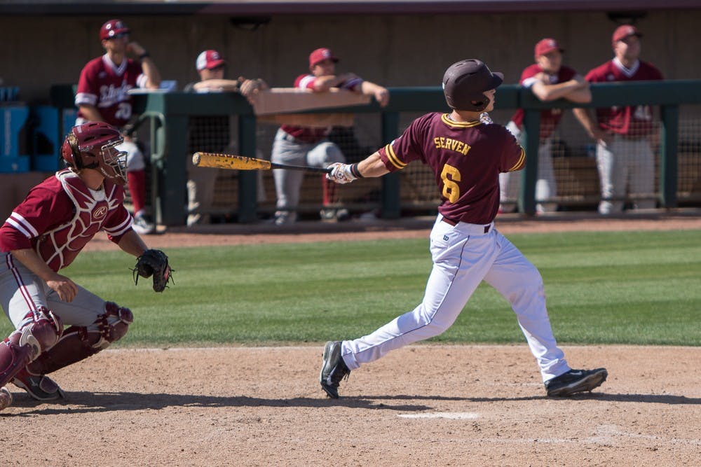 Sophomore Brian Serven hits a three-run home run in the bottom of the eighth inning against Stanford at Phoenix Municipal Stadium on Sunday, March 29, 2015. The Sun Devils defeated the Cardinal 14-6. (Jacob Stanek/The State Press)