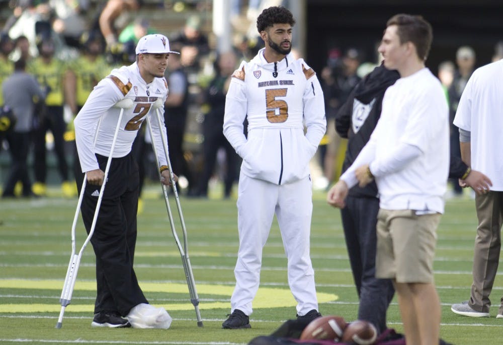 ASU redshirt freshman quarterback Brady White (2) and redshirt sophomore Manny Wilkins (5) look on during warm ups before a game versus the Oregon Ducks in Autzen Stadium in Eugene, Oregon, on Saturday, Oct. 29, 2016.