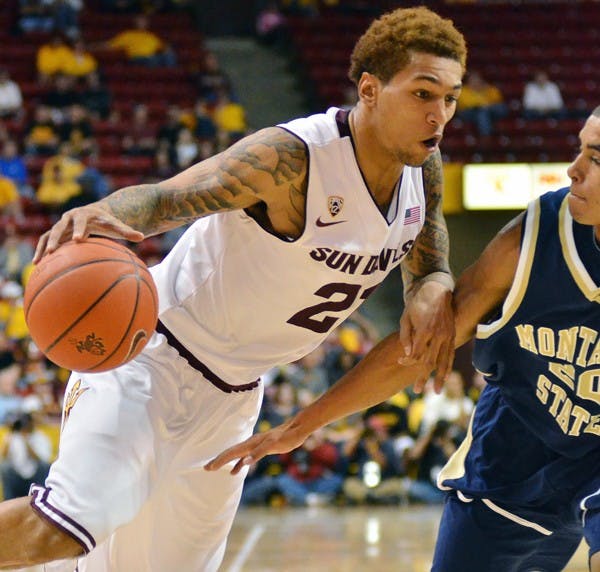 TAKE TWO: ASU sophomore wing Keala King drives inside against Montana State sophomore forward Shawn Reid during the Sun Devils’ win on Friday. ASU looks to go 2-0 when the take on Pepperdine at home on Tuesday. (Photo by Aaron Lavinsky)