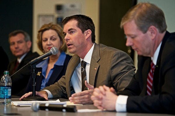 REPUBLICANS: Congressional candidate Mark Spinks makes his case for office before students during the Great Republican Debate held Thursday night in the W.P. Carey business school. Joining Spinks in the moderated debate were fellow Republican candidates Jim Ward, David Schweikert, Susan Bitter-Smith and Chris Savino. (Photo by Michael Arellano)