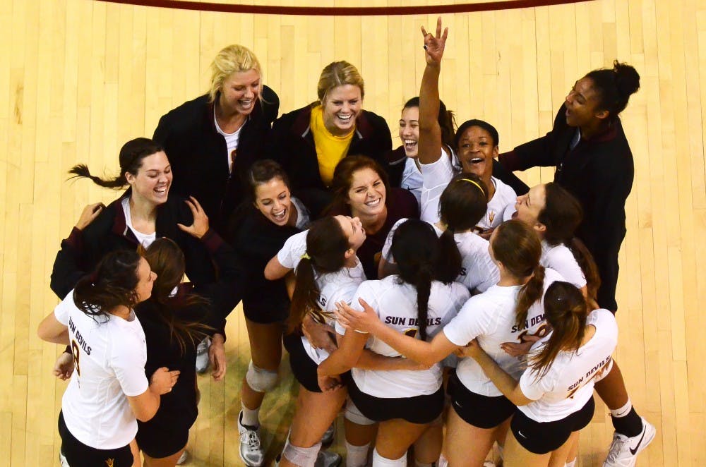 The ASU Volleyball Team celebrates after defeating the Wildcats 3-1 to win this year's Territorial Cup.