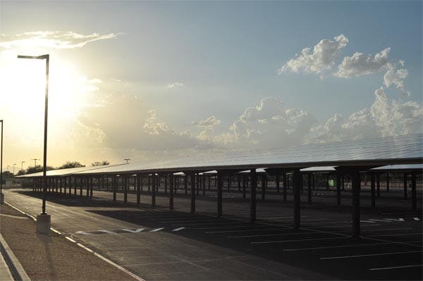 SUN SHADE: New Solar panels at the ASU West campus have been installed in the campus parking lots, adding to ASU's sustainability and providing shade as a bonus. (Photo by Chris Stark)