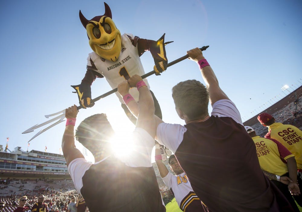 ASU mascot Sparky practices doing push-ups before  a game against the USC Trojans in the Los Angeles Memorial Coliseum on Saturday, Oct. 1, 2016. 