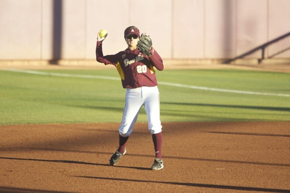 Tough Test: ASU sophomore Sam Parlich warms up at second base during the Sun Devils’ game against Cal Poly on Feb. 11. ASU takes on defending champion UCLA this weekend after become the nation’s top-ranked team this week. (Photo by Scott Stuk)