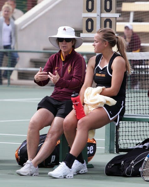 Coach Sheila McInerney talks to Michelle Brycki in between matches at the ASU Thunderbird Invitational on Nov. 4, 2011. Brycki is one of two seniors on the team that has learned to become a better leader under McInerney. (Photo by Beth Easterbrook)