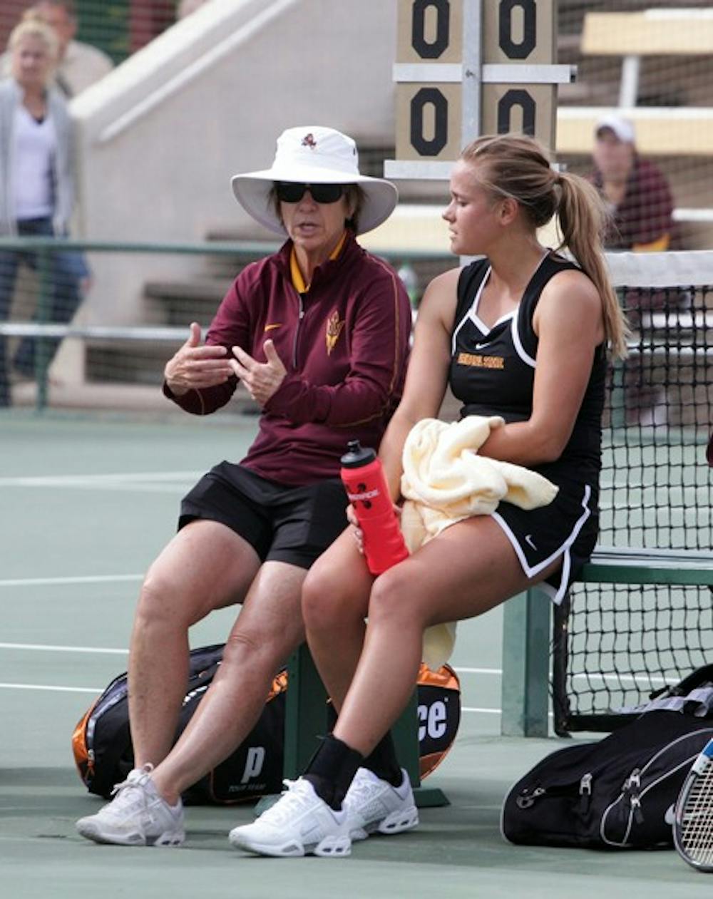 Coach Sheila McInerney talks to Michelle Brycki in between matches at the ASU Thunderbird Invitational on Nov. 4, 2011. Brycki is one of two seniors on the team that has learned to become a better leader under McInerney. (Photo by Beth Easterbrook)