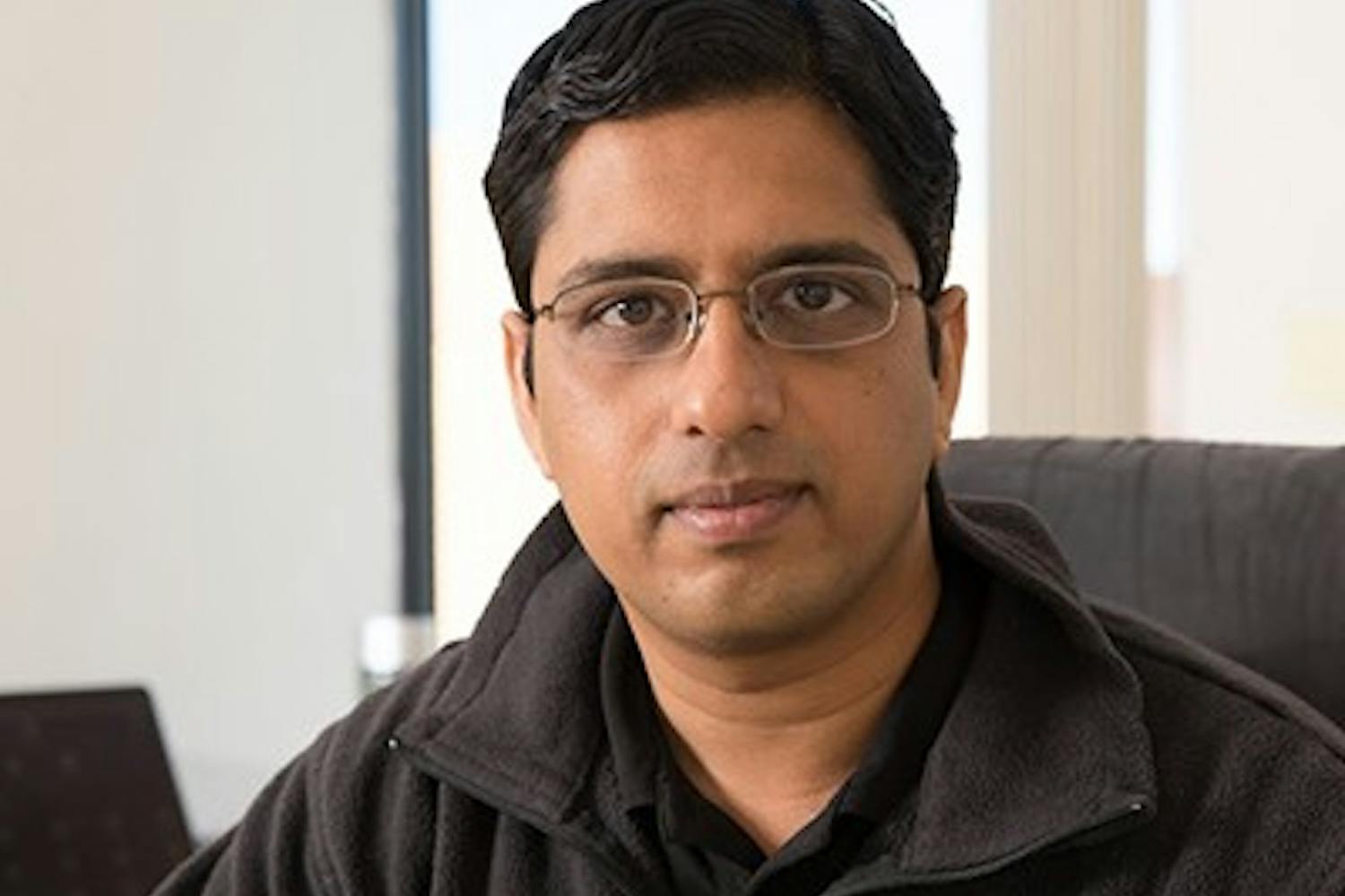 Assistant professor Jagannathan Rajagopalan poses at his office in the Engineering Research Center. Rajagopalan designed the structure for biohybrid swimmers. (Photo by Andrew Ybanez)