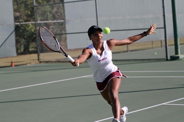 Sianna Simmons lunges for the ball at the ASU Thunderbird Invitational on Nov. 5, 2011. Simmons and the Sun Devils are confident their extra week of practice will help them beat NAU. (Photo by Lisa Bartoli)