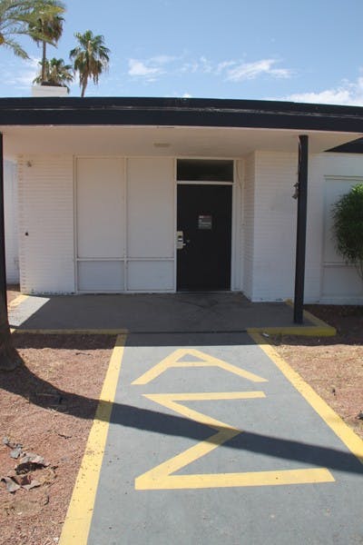 EMPTY NEST: The entrance to the Alpha Epsilon Pi fraternity house bears a "No Trespassing" sign as the fraternity is currently in the process of being reinstated at ASU. (Photo by Rosie Gochnour)