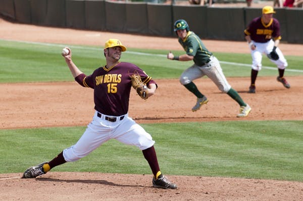 Sophomore pitcher Darin Gillies reaches back to fire a pitch against Oregon on April 7. The ASU baseball team faces UNLV for a mid-week game on Wednesday then travel to USC Friday. (Photo by Molly J. Smith)